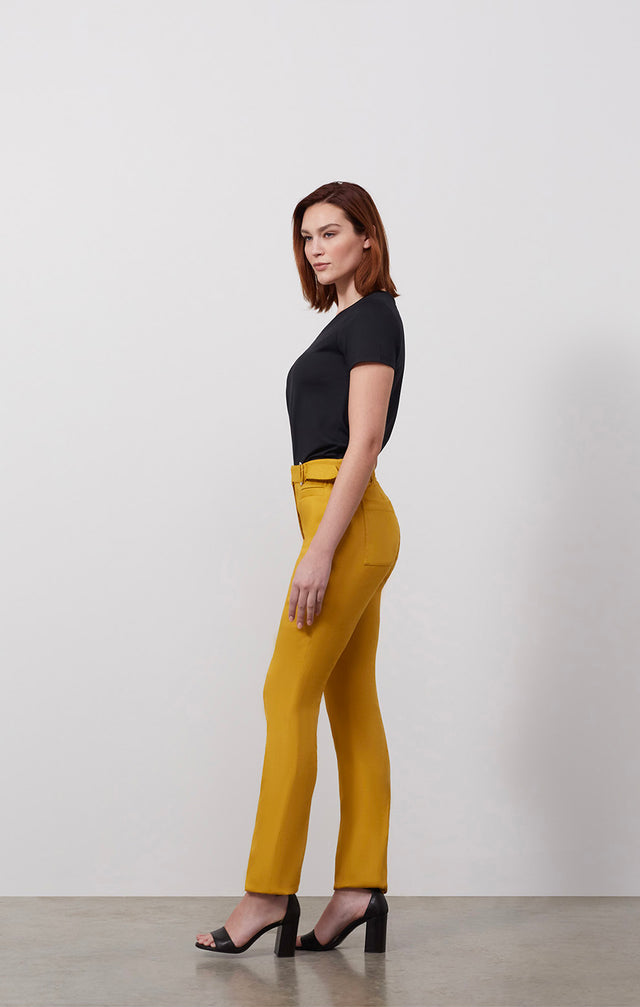 Ecomm photo of a model wearing the El Dorado pants, which is a belted Italian stretch linen pants.