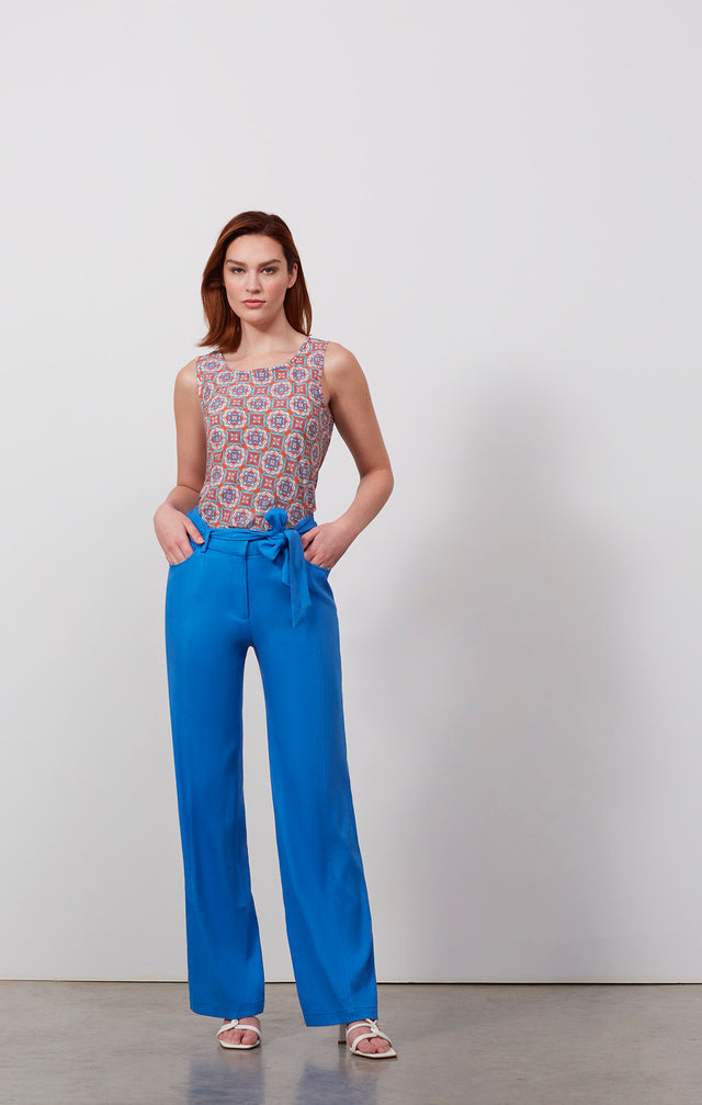 Ecomm photo of a model wearing the Tanager pants, which is an Italian stretch linen twill pants.