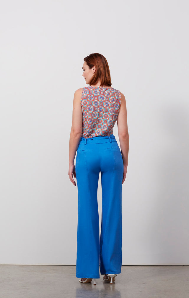 Ecomm photo of a model wearing the Tanager pants, which is an Italian stretch linen twill pants.