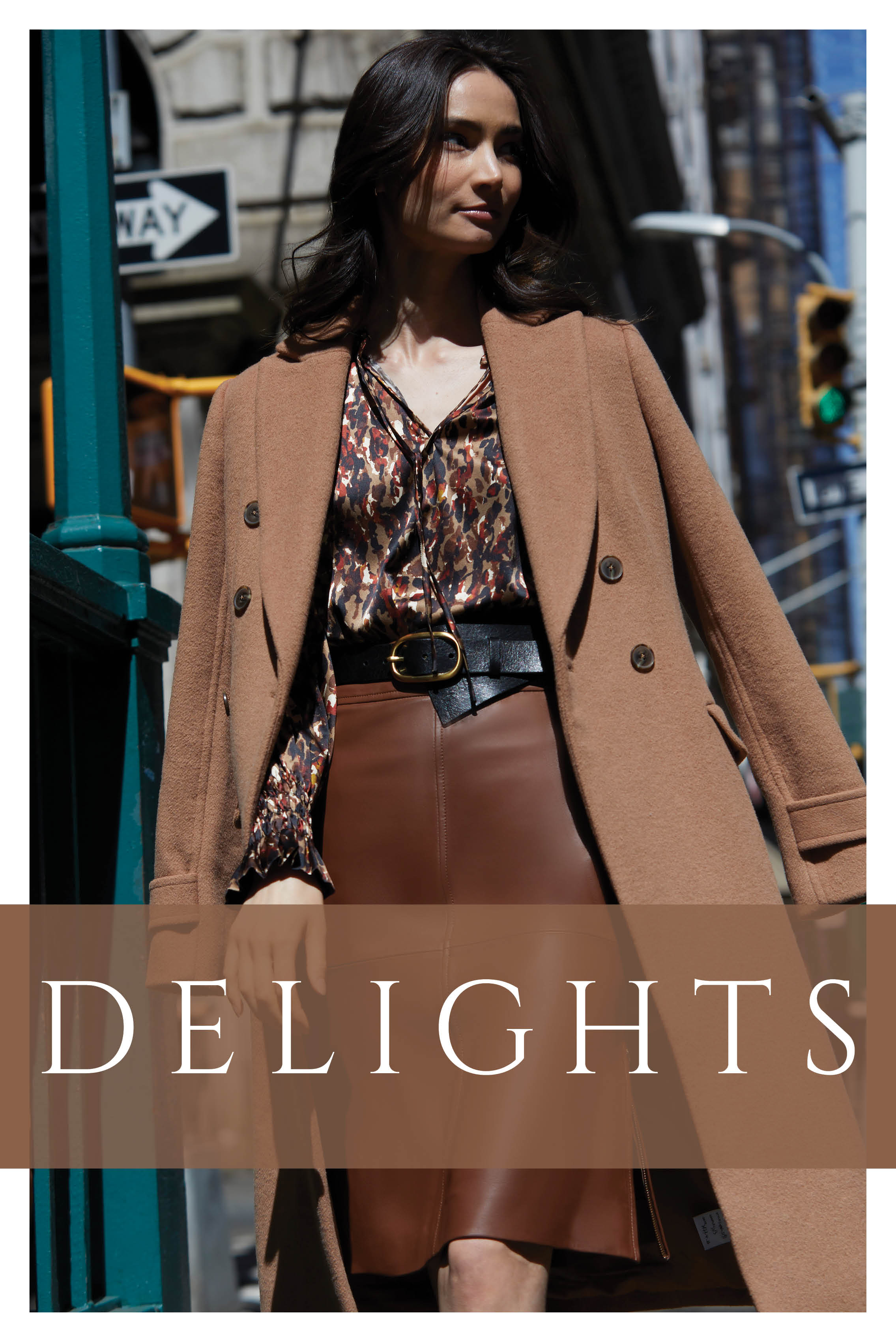 This silk top, adorned with an animal print reminiscent of a Pollock painting, adds a bold and artistic flair to the ensemble. Paired with a deep caramel lamb-leather skirt, the combination of textures and colors creates an arresting visual contrast.