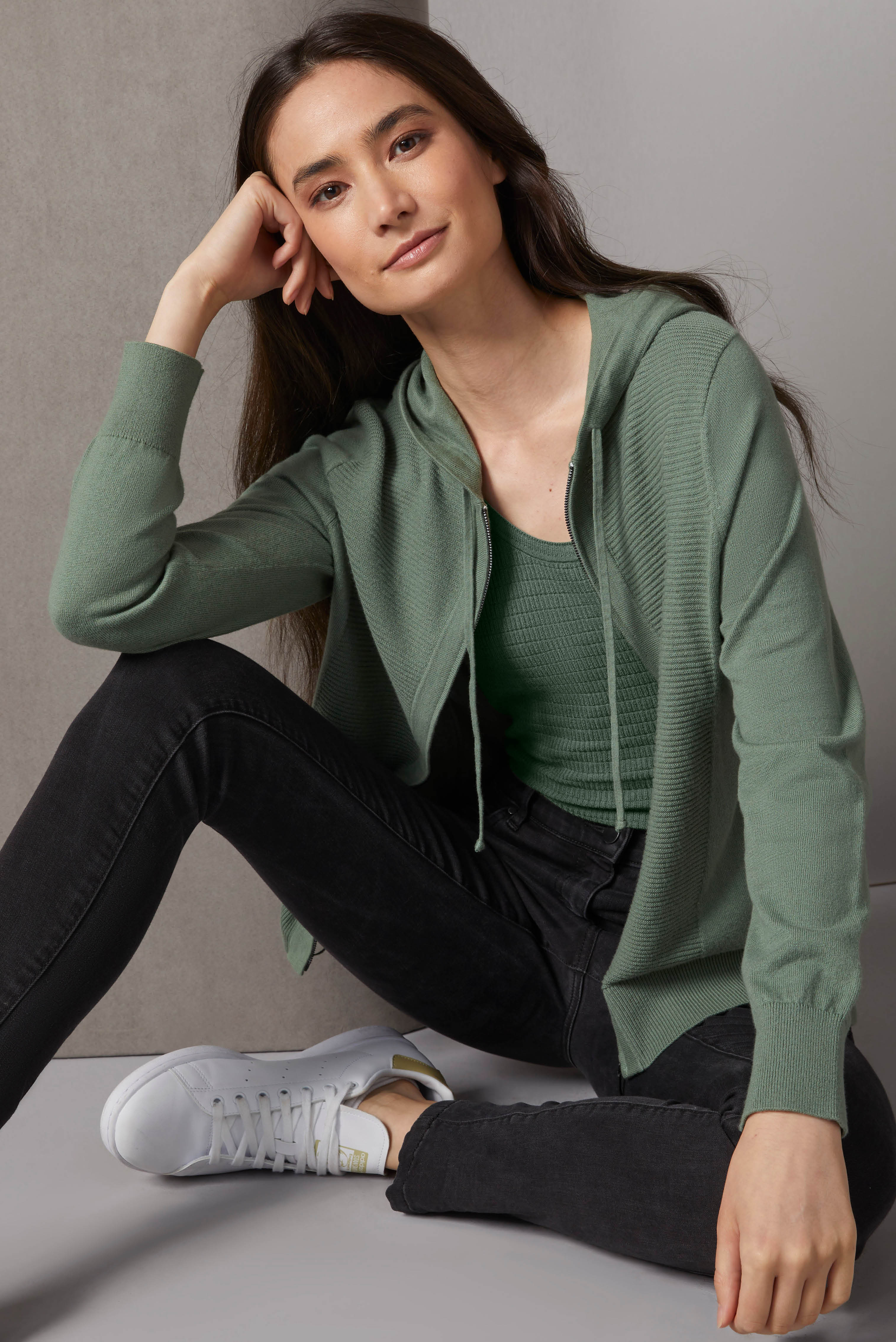 This luxury knit hoodie enriches casual outfits with rich texture and a soft hand. This style is cashmere softened and textured with panels of flat back ribs.