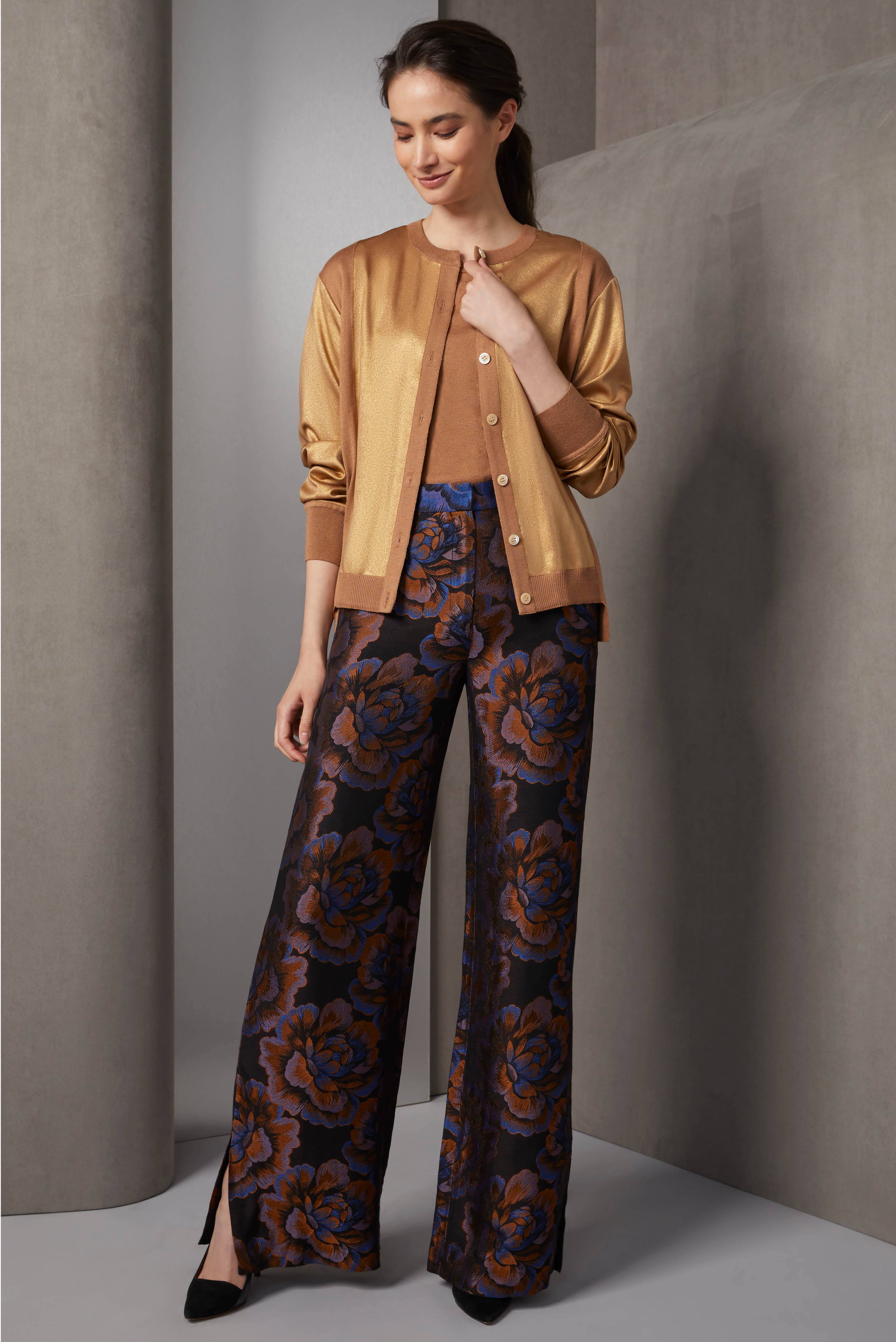 This silk and cashmere twinset in warm camel boasts a cardi with a gold-foil georgette front and troca shell buttons, plus a versatile cap-sleeve pullover.