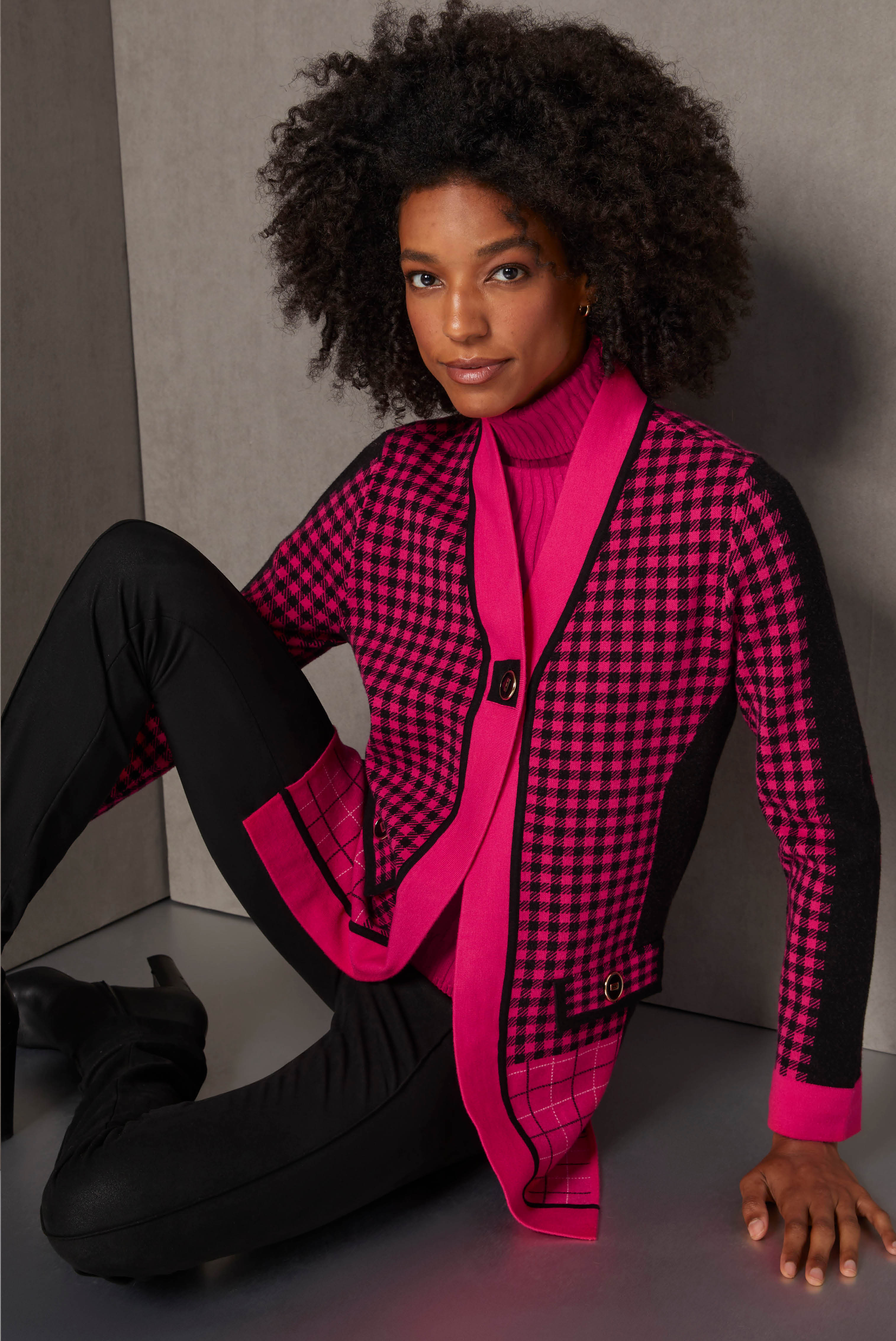 Two standout knits present the glamour of very berry winter pink. The complex cardigan has solid colorblock, tattersall plaid, and check panels, plus a novelty gold-rimmed button.