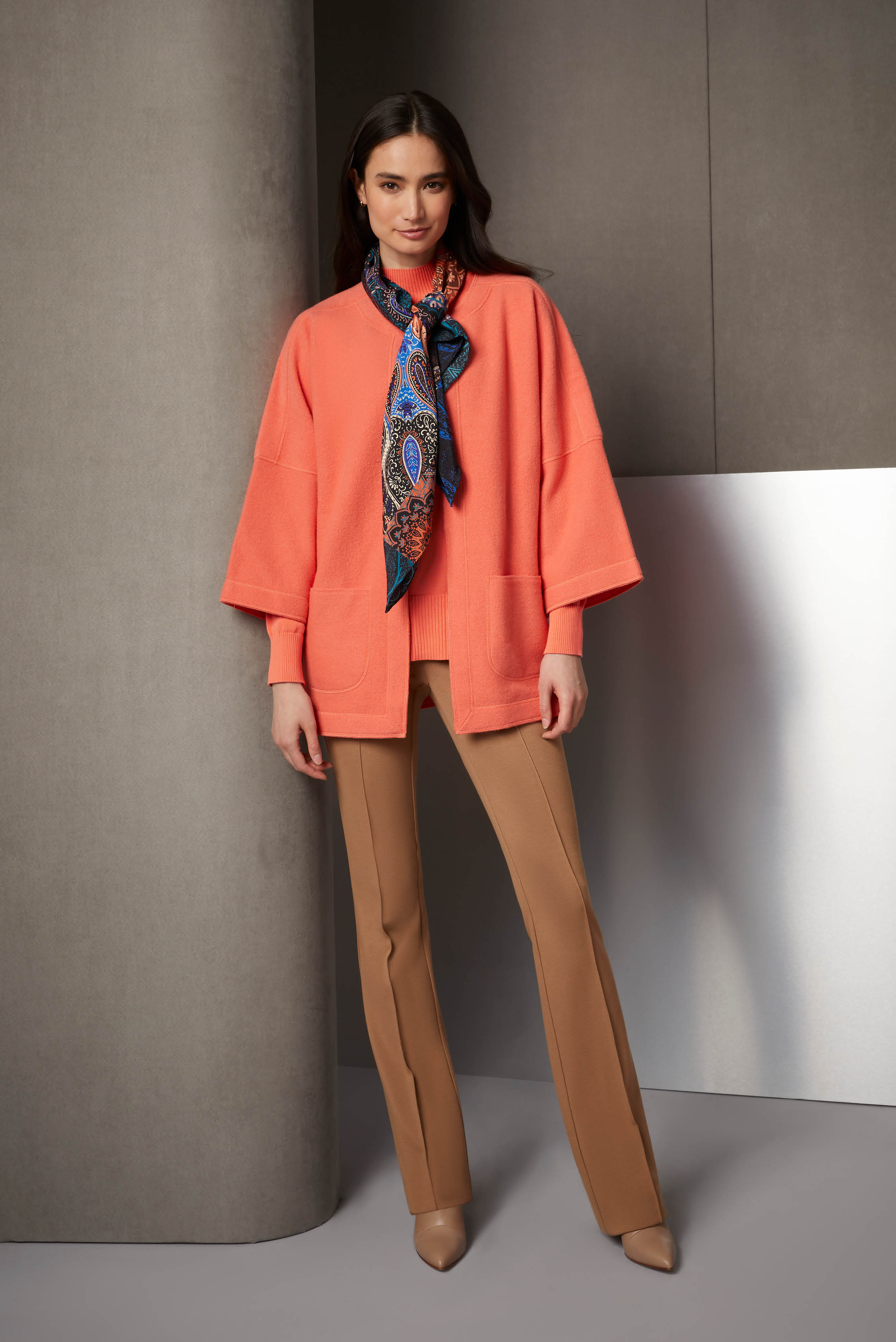 This fab foursome ensembles beautifully into a rich color statement: a bold apricot merino swing jacket, a matching mock turtleneck in rare, organic Suvin cotton, camel Italian ponte pants, and a paisley silk scarf.