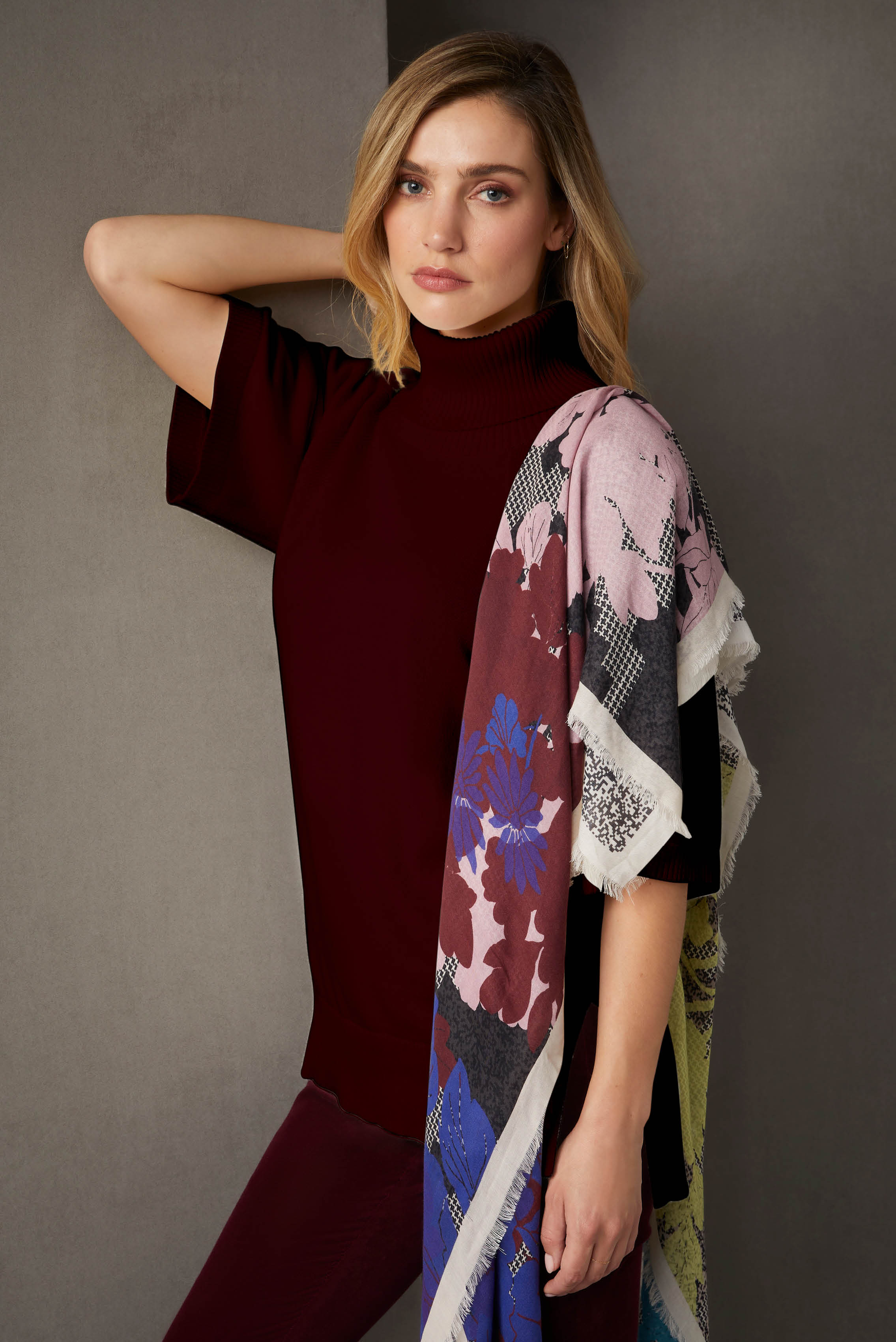 Autumn is the time for red wine and wine red fashion shades. This silk-softened knit turtleneck with easy raglan elbow sleeves is the matte cabernet mate for skinny stretch jeans in plush Spanish velvet.