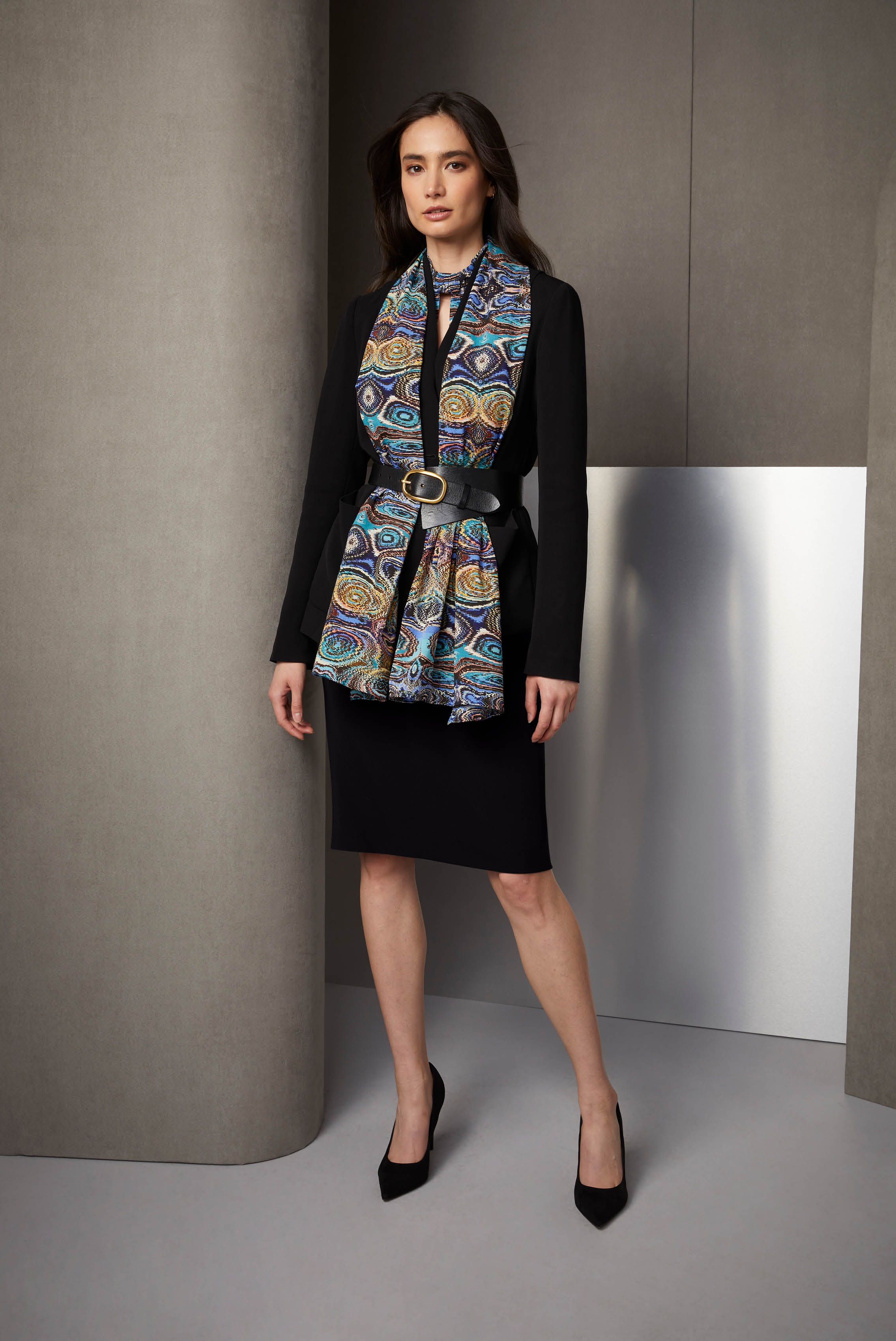 Mineral wonders exalt this stretch silk scarf and knot-front blouse. The geode collection at the Natural History Museum is a source for the eight wonderful colors in the scarf and blouse.