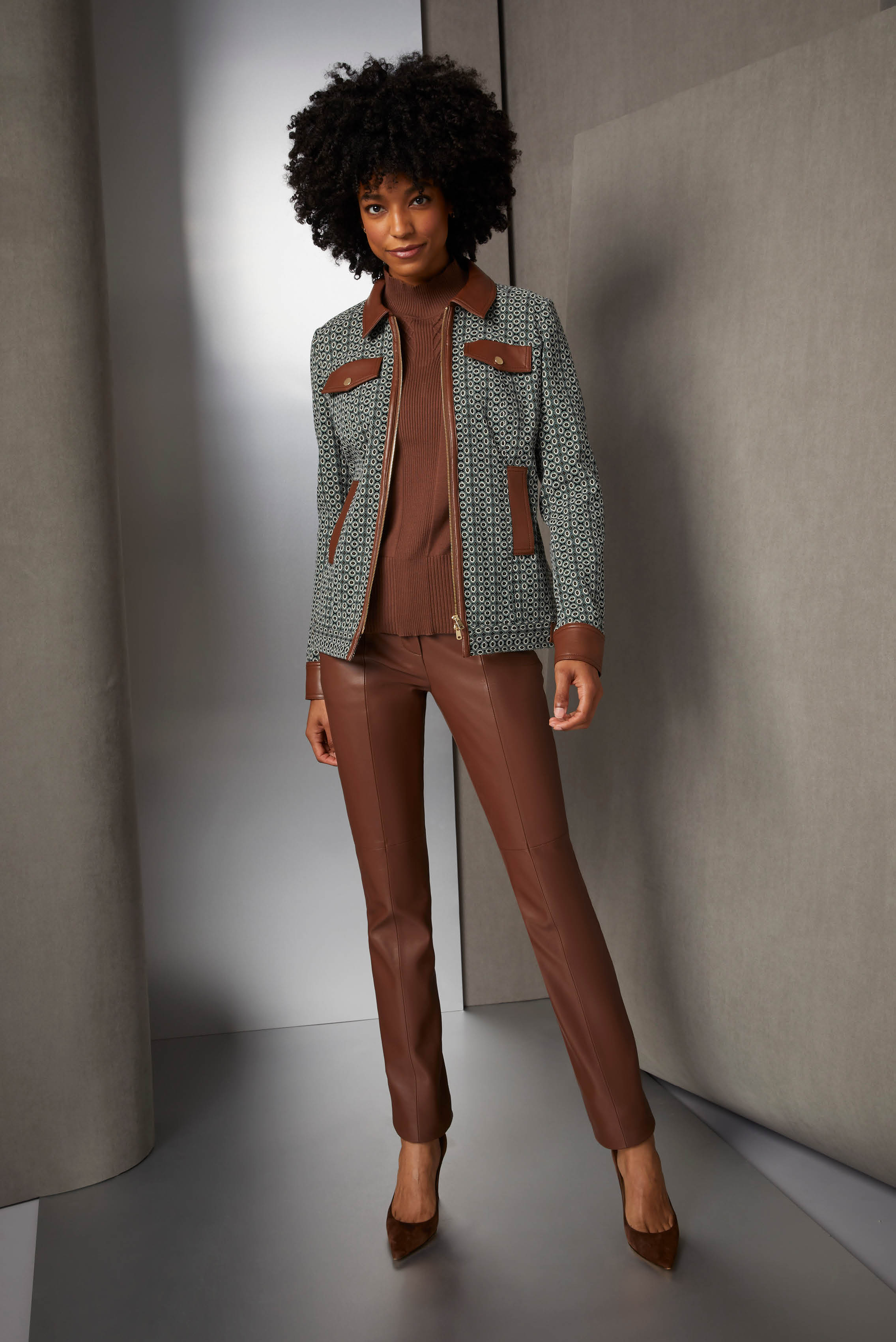 Make a trendy impression this fall with an outfit that combines deep caramel European lamb pants and a matching mock turtleneck in premium Suvin cotton, textured with crisscross traveling ribs.