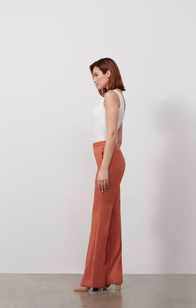 Ecomm photo of a model wearing the Patio pants, which is an airy wide-leg twill pants.