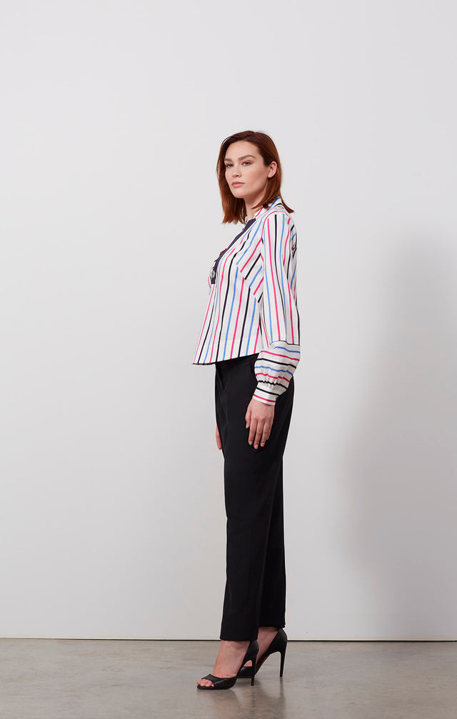 Ecomm photo of a model wearing the Ibiza shirt, which is a stripe print blouse in stretch cotton.