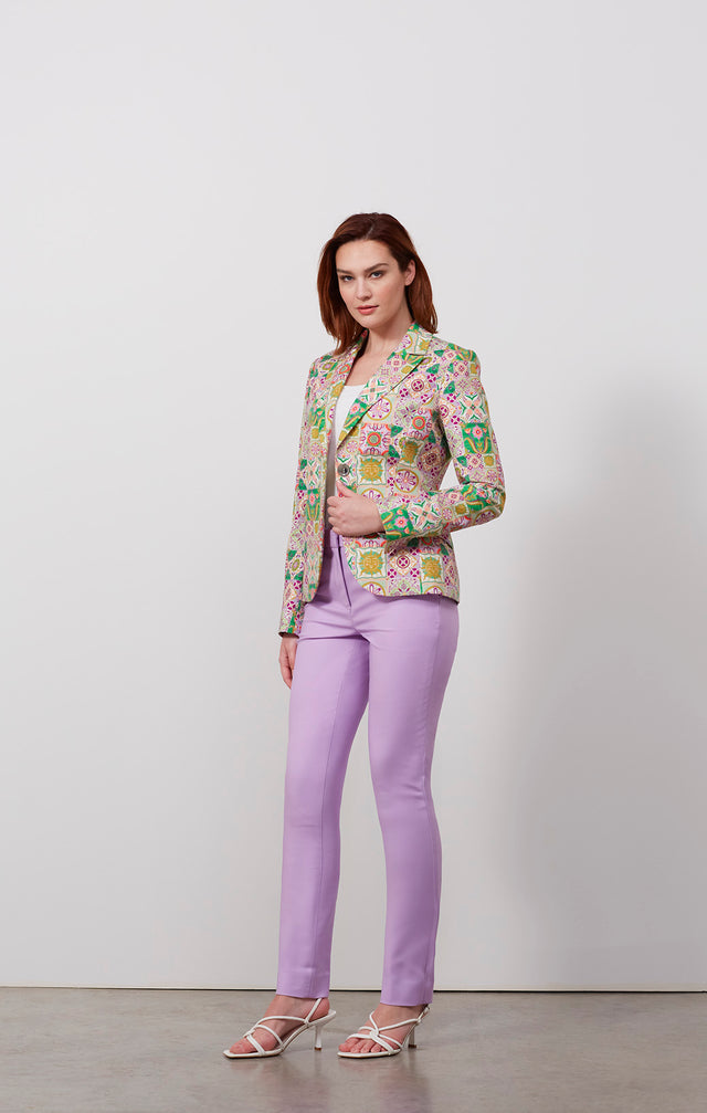 Ecomm photo of a model wearing the Alcazar jacket, which is a Tile-Printed Sateen Jacket.