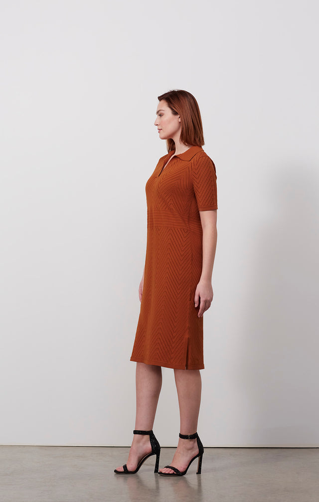 Ecomm photo of a model wearing the Henna dress, which is a jersey & pointelle shift dress.