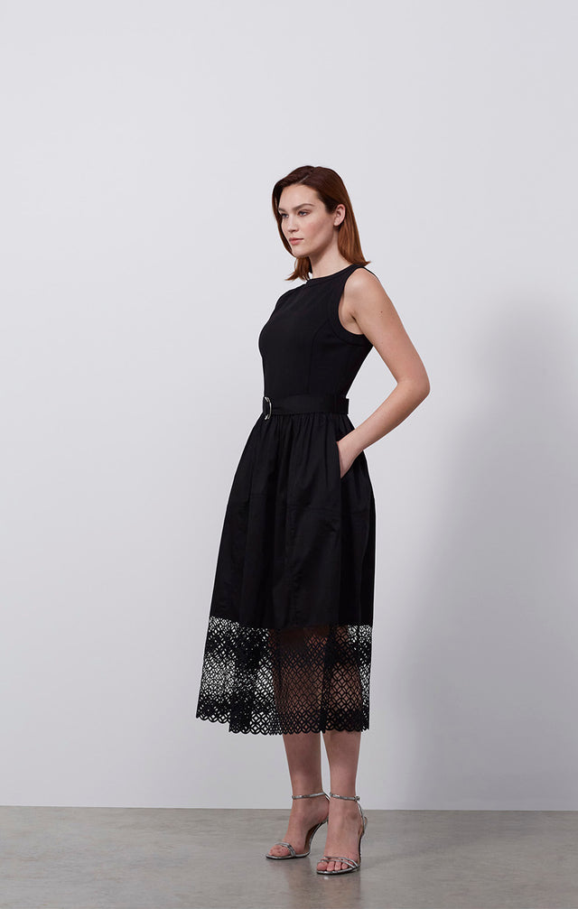 Ecomm photo of a model wearing the Tempranillo dress, which is a belted dress In ponte, shirting, & lace.