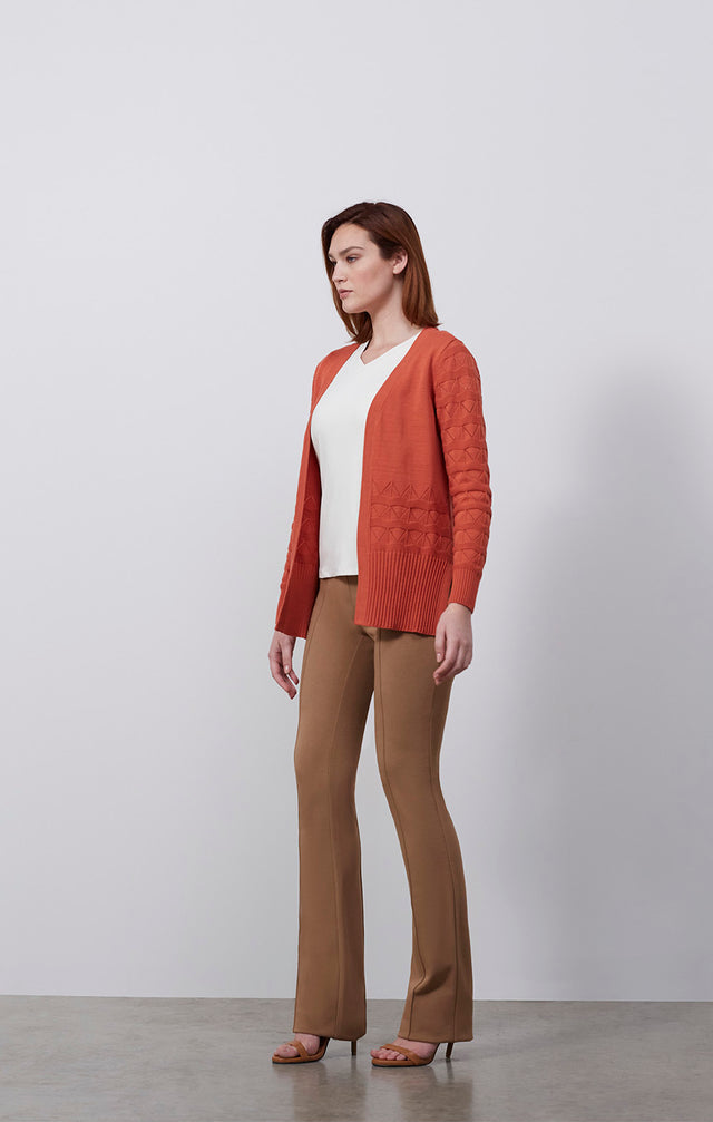 Ecomm photo of a model wearing the Turron-Cardi, which is a silk-enriched cardigan.