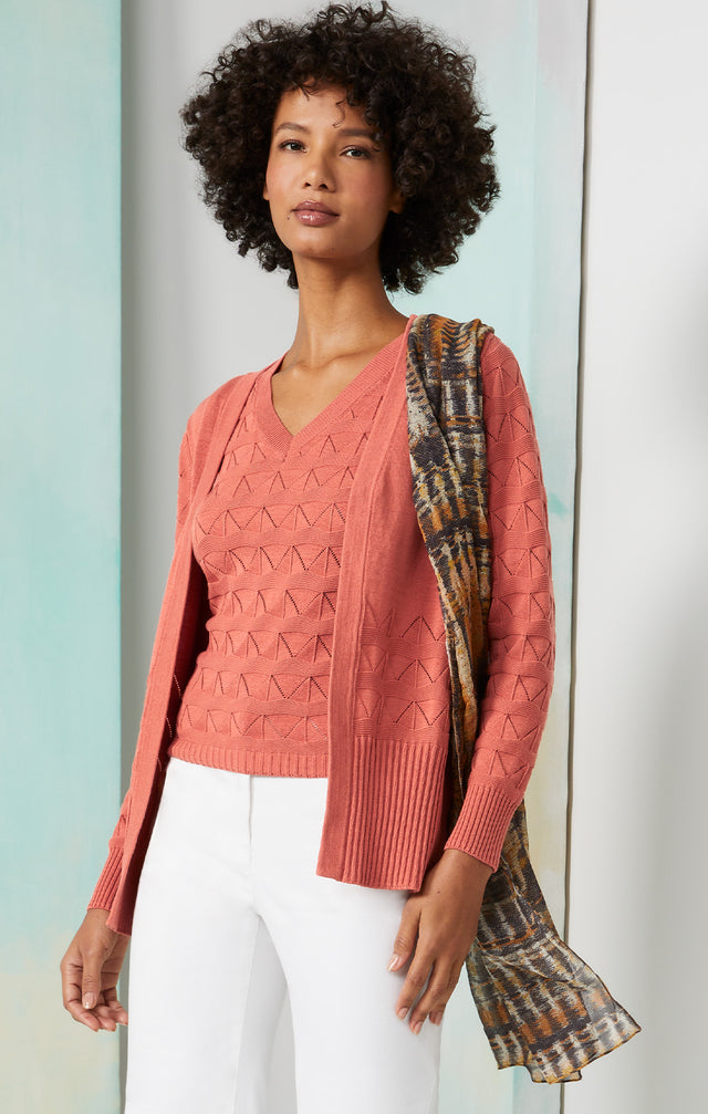 Lookbook photo of a model wearing the Turron-Shell, which is a silk-enriched knit shell.