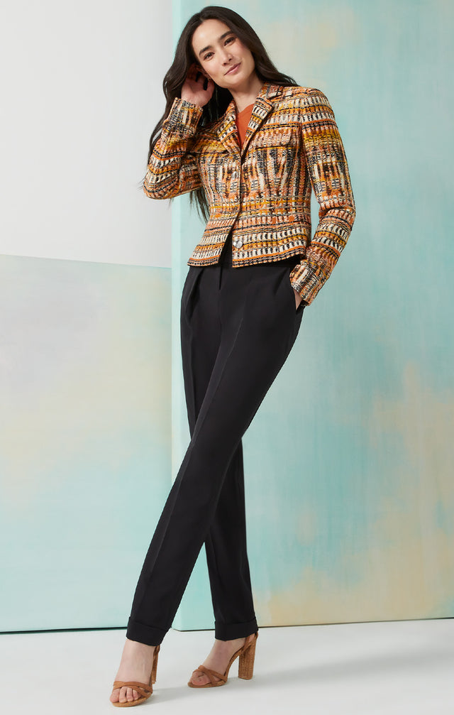 Lookbook photo of a model wearing the Finesse-Blk pants, which is a flap-pocket, double-weave pants.